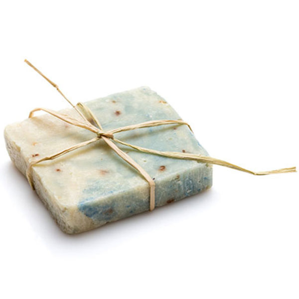 Handmade soap wrapped in organic fibers.